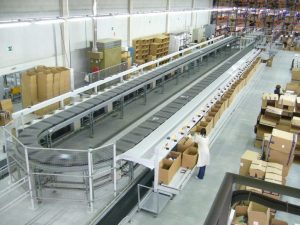 Integrasi Conveyor dengan Mesin Sortir Otomatis untuk Produksi Lebih Efisien